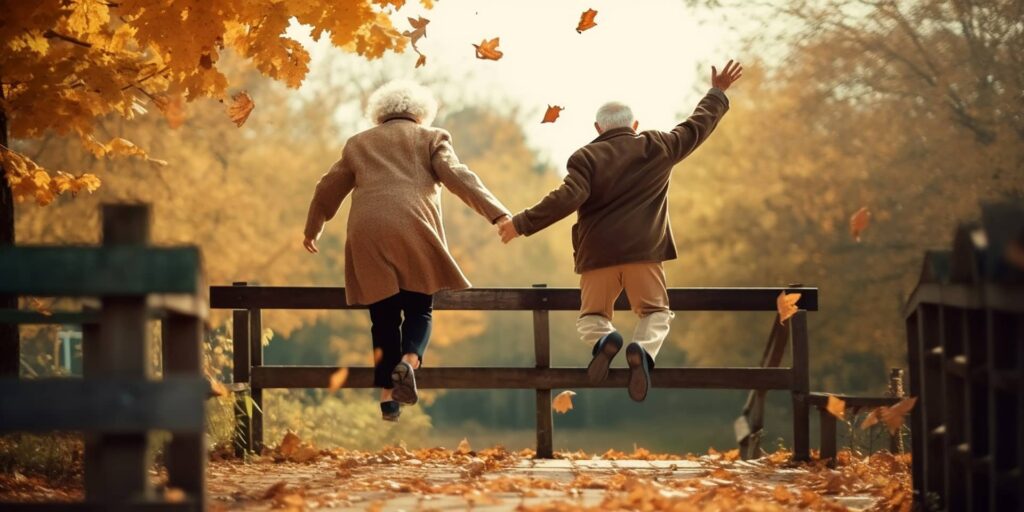 pareja de ancianos saltando una valla en otoño